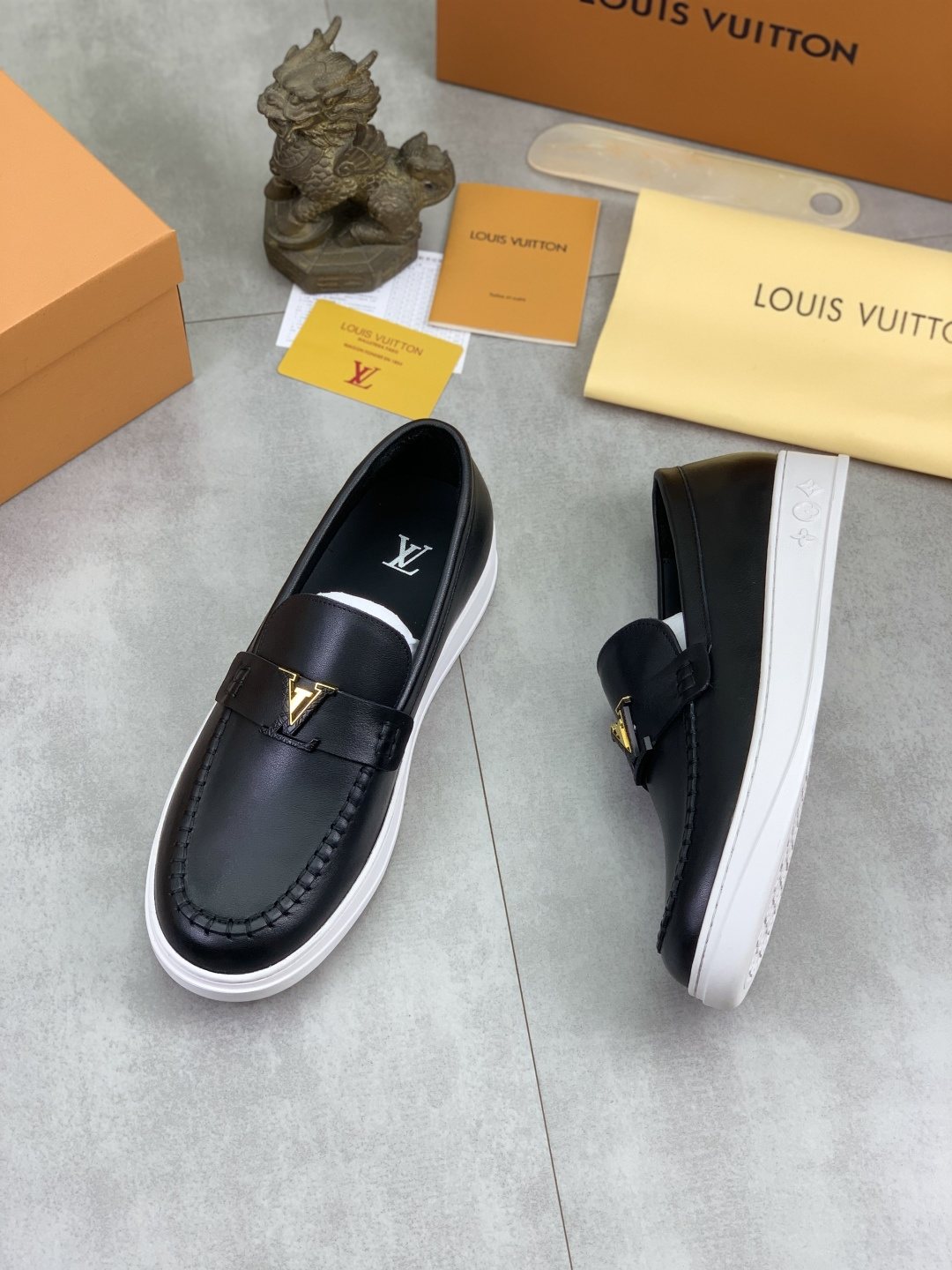 Louis Vuitton Metal Emblem Slip-On Loafers